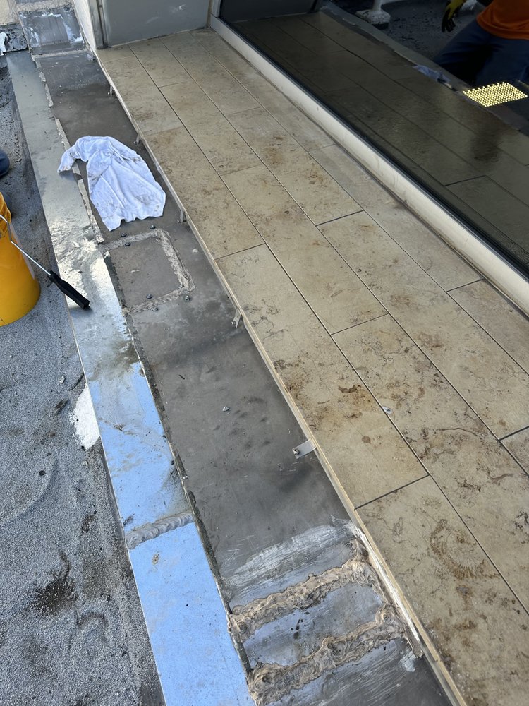 Slide of Millan Roofing Industries