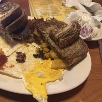 The Ugly Rooster Cafe - Cracked Eggs with home fries n Rye toast - Breakfast & Brunch Near Me - Mechanicville, New York The Ugly Rooster Cafe - Cracked Eggs with home fries n Rye toast - Breakfast & Brunch Near Me - Mechanicville, New York
