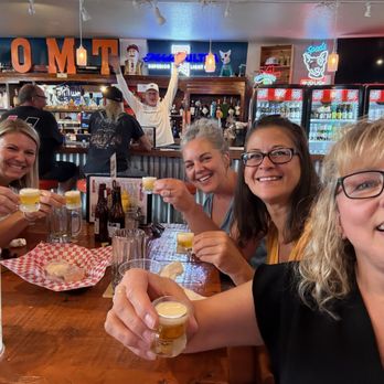 Old Mill Tavern - Happy patrons! Mark "photo bombing" in the background! He's the new owner. Funny guy! - Bars Near Me - Peshastin, Washington Old Mill Tavern - Happy patrons! Mark "photo bombing" in the background! He's the new owner. Funny guy! - Bars Near Me - Peshastin, Washington