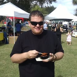 Taste of Bonita - Paul H. Eating some chili from Teds Montana grill, I think he likes it, I see a little smile ;-)