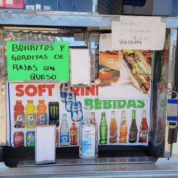 Julie's Burritos - a display of burritos and sodas - Mexican Near Me - Albuquerque, New Mexico