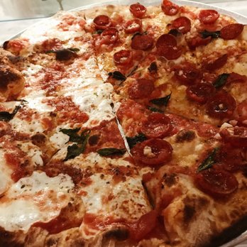 Juliana's - Half margherita half marinara with pepperoni - Pizza Near Me - Brooklyn, New York Juliana's - Half margherita half marinara with pepperoni - Pizza Near Me - Brooklyn, New York