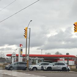 Petro Canada - Gas station from across the street. I'm looking eastbound on 16th Avenue.