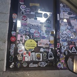 a window covered in stickers a window covered in stickers