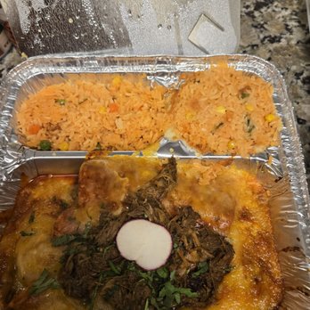 Dona Leti's - Birria enchiladas with red sauce served with rice - Cocktail Bars Near Me - Houston, Texas