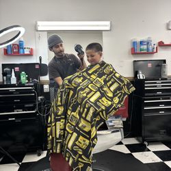 Family Barber Shop - My boy and his barber.