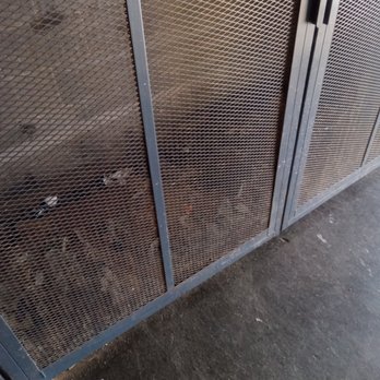 Fitzgerald's Foods - a metal door with a hole in it - Grocery Near Me - Simsbury, Connecticut Fitzgerald's Foods - a metal door with a hole in it - Grocery Near Me - Simsbury, Connecticut
