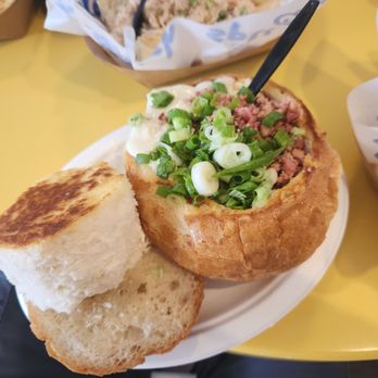 Splash Cafe - Clam chowder in bread bowl with green onions & bacon. - American Near Me - Pismo Beach, California