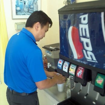 Little Zeus - Asian guy getting ice tea - Greek Near Me - Carlsbad, California Little Zeus - Asian guy getting ice tea - Greek Near Me - Carlsbad, California