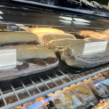 Bella Bakery - a display of sandwiches and pastries - Bakeries Near Me - Miami Springs, Florida