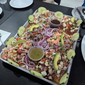 The Marisco Spot - Tostada platter with fish shrimp ceviche octopus jaiba and imitation abalone - Mexican Near Me - Lawndale, California The Marisco Spot - Tostada platter with fish shrimp ceviche octopus jaiba and imitation abalone - Mexican Near Me - Lawndale, California