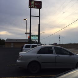 KFC - There kfc sign is being held together by some straps. Be careful