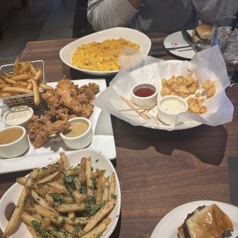 Yard House - Parm Truffle Fries, Hand-Battered Chicken Tenders, Classic Sliders, Mac Cheese - New American Near Me - New York, New York Yard House - Parm Truffle Fries, Hand-Battered Chicken Tenders, Classic Sliders, Mac Cheese - New American Near Me - New York, New York