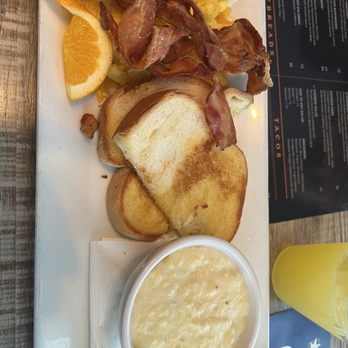 Caswell Station - Eggs, sourdough toast and grits - Bars Near Me - Charlotte, North Carolina