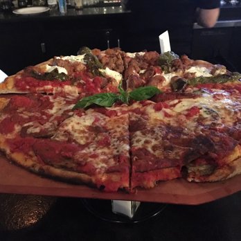Anthony's Coal Fired Pizza & Wings - Half eggplant Marino and half Paul and young Ron pizza - Pizza Near Me - Edison, New Jersey