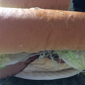 Big Cheese Pizza & Grinders - two sandwiches on a plate - Pizza Near Me - Middletown, Connecticut