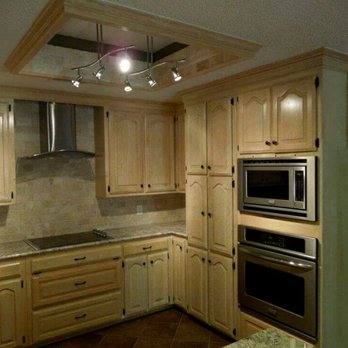 Mead Renovation Solutions - a kitchen with light wood cabinets - General Contractors Near Me - Waco, Texas Mead Renovation Solutions - a kitchen with light wood cabinets - General Contractors Near Me - Waco, Texas