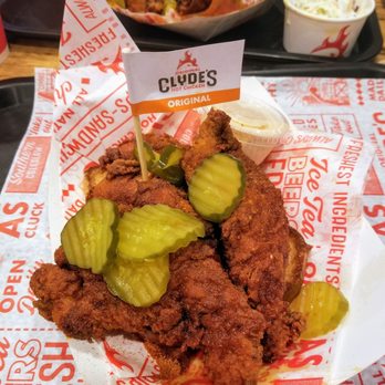 Clyde's Hot Chicken - Chicken tenders (4 pieces & slice of bread is hidden underneath the chicken) - Chicken Shop Near Me - Fullerton, California Clyde's Hot Chicken - Chicken tenders (4 pieces & slice of bread is hidden underneath the chicken) - Chicken Shop Near Me - Fullerton, California