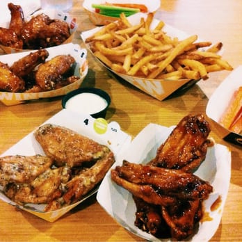 Buffalo Wild Wings - We like to get our traditional wings 'WET' and in all flats. - Sports Bars Near Me - Petaluma, California Buffalo Wild Wings - We like to get our traditional wings 'WET' and in all flats. - Sports Bars Near Me - Petaluma, California