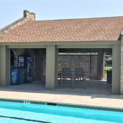 Master Remodelers - Home Owner's Association After Rebuild of Pool House.