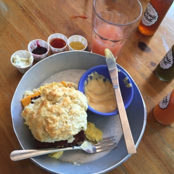 Biscuit Head - The classic - biscuit sandwich with egg, cheese and maple sriracha sausage. Side hollandaise. - Bakeries Near Me - Asheville, North Carolina Biscuit Head - The classic - biscuit sandwich with egg, cheese and maple sriracha sausage. Side hollandaise. - Bakeries Near Me - Asheville, North Carolina