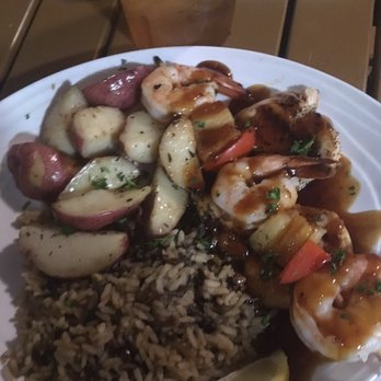 Doc's Seafood & Steaks - Surf and turf with rice and roasted rosemary new potatoes - Seafood Near Me - Corpus Christi, Texas