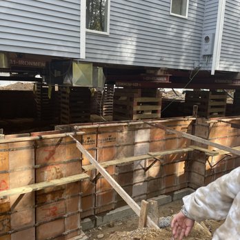 Grondin Builders - a man standing in front of a building under construction - General Contractors Near Me - Tolland, Connecticut Grondin Builders - a man standing in front of a building under construction - General Contractors Near Me - Tolland, Connecticut