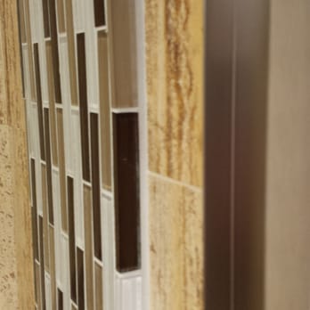 Porcelain Tile USA - a bathroom with a toilet and sink - Flooring Near Me - Mineola, New York Porcelain Tile USA - a bathroom with a toilet and sink - Flooring Near Me - Mineola, New York