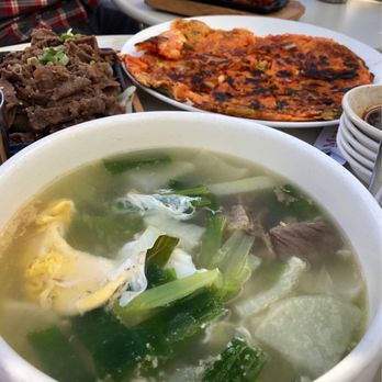 Manna - Our dinner: galbi, galbi tang, kimchi jeon, spicy pork - Korean Near Me - San Francisco, California