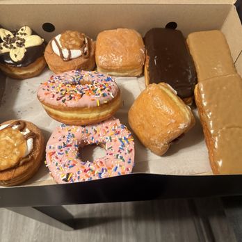 Legendary Doughnuts - A few of the doughnuts. Sorry ate 2 before the picture. Pink one is called the Simpson, it's huge. - Bakeries Near Me - Covington, Washington Legendary Doughnuts - A few of the doughnuts. Sorry ate 2 before the picture. Pink one is called the Simpson, it's huge. - Bakeries Near Me - Covington, Washington