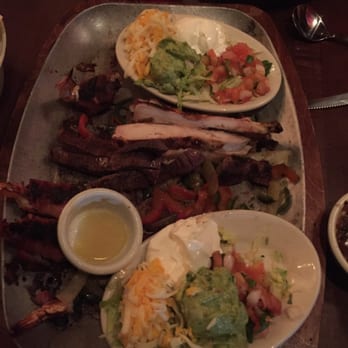Uncle Julio's - Plato de Amor. Chicken and steak fajitas with bacon wrapped shrimp - Mexican Near Me - Gaithersburg, Maryland