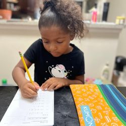 Kumon Math and Reading Center of Solana Beach - Lots of concentration from 6-year-old Harper as she works through the remainder of her Kumon Worksheets.