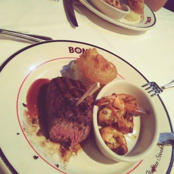 Bond 45 - Filet mignon well done / side of mashed potatoes and shrimp. Delicious & cooked just like I like it. Fried onion ring topping the mash. - Italian Near Me - Oxon Hill, Maryland