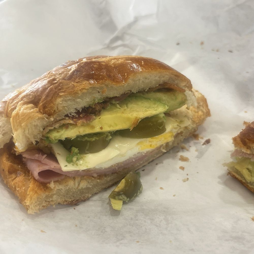 this is a bacon turkey egg and cheese croissant, this shit is bomb ASF it has, avacado mayo and jalapeños this is a bacon turkey egg and cheese croissant, this shit is bomb ASF it has, avacado mayo and jalapeños 