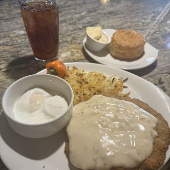 Atlantis Purple Parrot - Country Fried Steak, poached eggs, hash browns, and a biscuit with honey butter - Breakfast & Brunch Near Me - RENO, Nevada