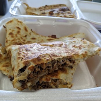 Mi Mercado - I'll share with you... Just a photo of one of our quesadillas :P sorry, not actually sharing it with you though. It's flavourful and juicy! - International Grocery Near Me - Renton, Washington