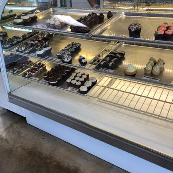 Gogo's Treatery - Plenty of cupcakes in the display - Ice Cream & Frozen Yogurt Near Me - Temple, Texas Gogo's Treatery - Plenty of cupcakes in the display - Ice Cream & Frozen Yogurt Near Me - Temple, Texas