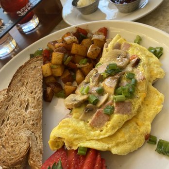 Brunch 101 - Hangover Omelet with Potatoes and Wheat Toast. Side sauces included... - Breakfast & Brunch Near Me - Cathedral City, California