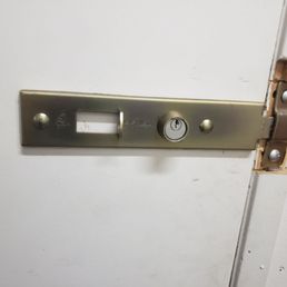 Pried the lock off. You'd think they'd have more secure locking mechanisms.
