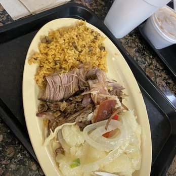 Sabor Del Caribe - Arroz con gandules con pernil y yucca - Puerto Rican Near Me - Orlando, Florida Sabor Del Caribe - Arroz con gandules con pernil y yucca - Puerto Rican Near Me - Orlando, Florida