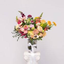 Sunflower Florist - Experience the elegance of our Botanica Peach Perfection bouquet, a beautifully crafted design that blends soft peach tones with lush greene