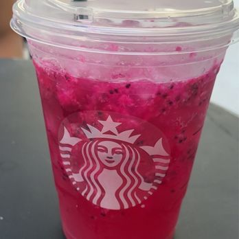Starbucks - a pink drink with a straw in a plastic cup - Coffee & Tea Near Me - Miami, Florida Starbucks - a pink drink with a straw in a plastic cup - Coffee & Tea Near Me - Miami, Florida