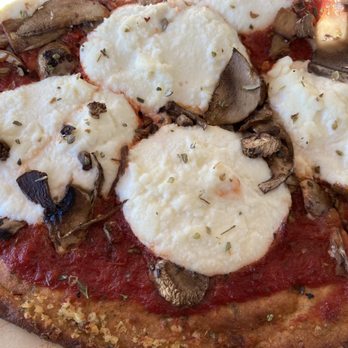 Blaze Pizza - Close up of my Keto crust pizza, ricotta cheese, red sauce, mushrooms and oregano . - Salad Near Me - Northridge, California Blaze Pizza - Close up of my Keto crust pizza, ricotta cheese, red sauce, mushrooms and oregano . - Salad Near Me - Northridge, California