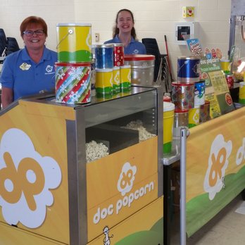 K&C Value Services - two women behind a food cart - Caterers Near Me