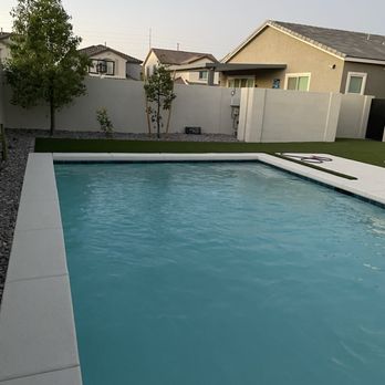 Acquabella Pools - Pool with wet decking. Wall built for pool equipment. - Hot Tub & Pool Near Me - Henderson, Nevada