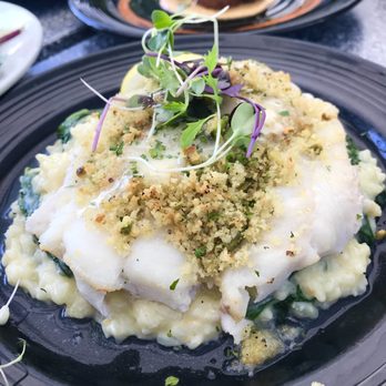Scargo Cafe - Pistachio Scrod fresh baked, pistachio encrusted scrod fillet served over creamy gouda risotto - American Near Me - Dennis, Massachusetts