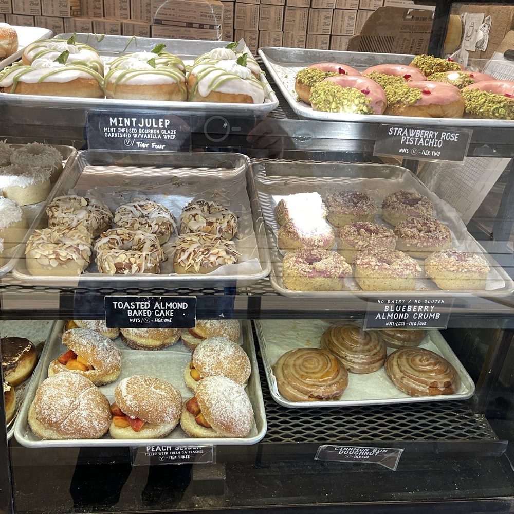 Revolution Doughnuts - Donut Display Case (includes the highly coveted Peach Slider) - Donuts Near Me - Atlanta, Georgia Revolution Doughnuts - Donut Display Case (includes the highly coveted Peach Slider) - Donuts Near Me - Atlanta, Georgia