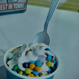 Cotton candy flavor with marshmallow sauce and m&m's