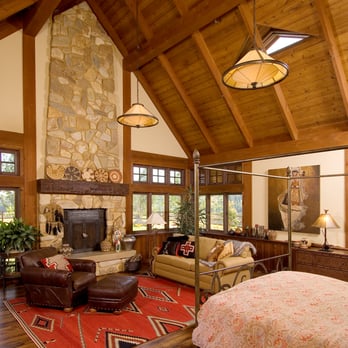 Crocker Homes - a spacious bedroom with a fireplace - General Contractors Near Me Crocker Homes - a spacious bedroom with a fireplace - General Contractors Near Me