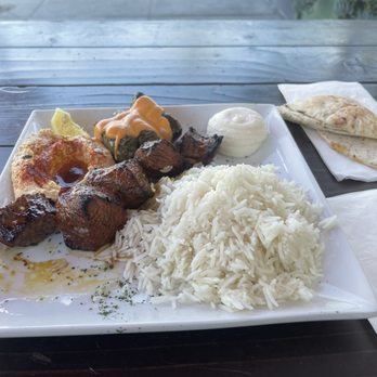 Crimson - #3 Filet Mignon Kabob, with dolma and Rose sauce on dolma - Mediterranean Near Me - Santa Monica, California Crimson - #3 Filet Mignon Kabob, with dolma and Rose sauce on dolma - Mediterranean Near Me - Santa Monica, California